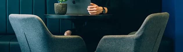 A facilitated review session in a meeting room