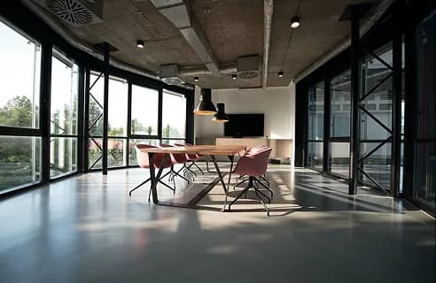 An open-plan office where buyers and professionals collaborate