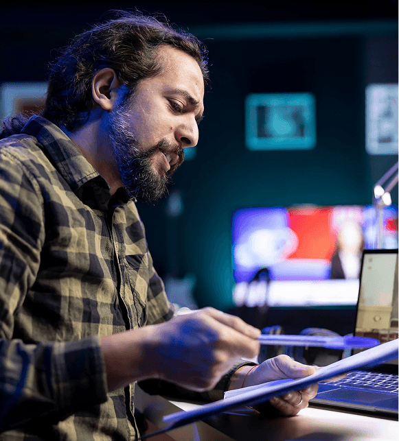 Specialist professional reviewing multi-display system