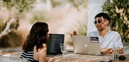 A buyer and a professional each checking status